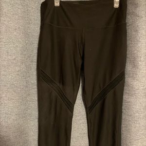 NWOT Avia black Leggings. Cute mesh detail on each leg.